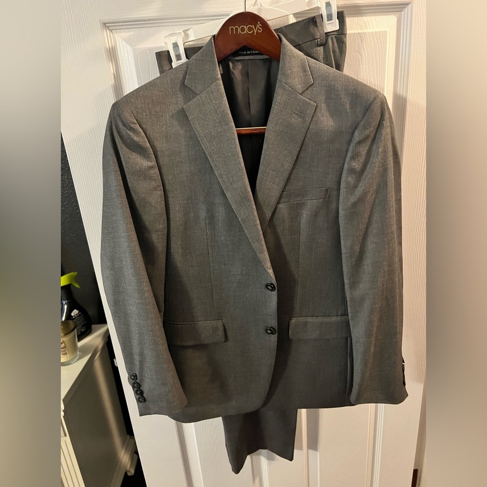 Grey slim fit Calvin Klein suit. 34 x 30 and 40s jacket